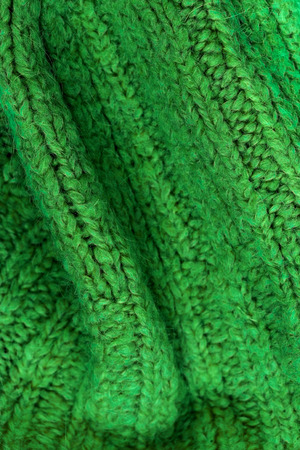 Knitted wool fabric texture background - winter texture close up