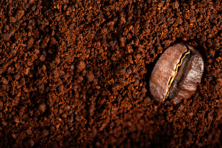 Ground Coffee with Roasted Coffee Beans , copyspace.  Espresso Texture macroの写真素材