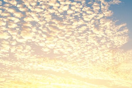 Sunrise  sky background with white clouds in  sunny summer or spring dayの写真素材