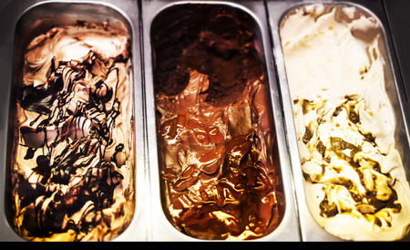 Gelateria - Mixed trays of ice cream in ice-cream shop close up