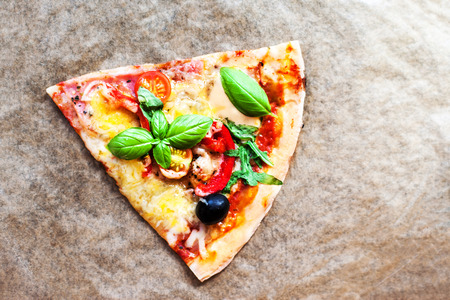 Margherita pizza with fresh basil. Slice of fresh italian classic pizzaの写真素材