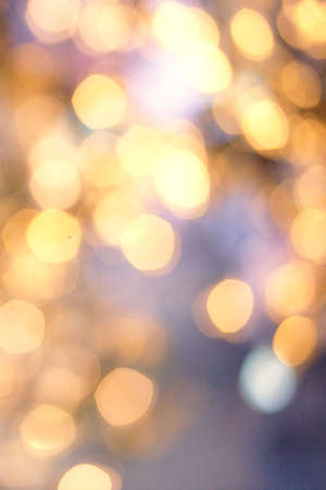 Christmas background with natural  bokeh and twinkled defocused lights. Festive blur backgroundの写真素材