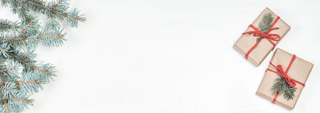 Christmas frame with Fir tree branches on white. Card Merry Christmas and Happy New Year with copy space.の写真素材