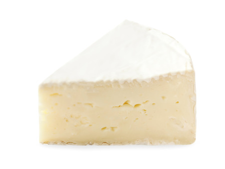 Piece of Brie  cheese isolated on white background close up. Fresh soft cheeseの写真素材