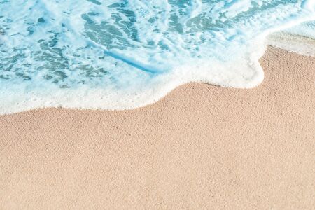 Soft Wave of Blue ocean in summer. Sandy Sea Beach  Background with copy space for text.