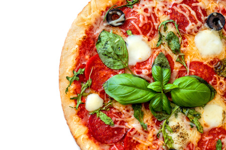 Pepperoni Pizza isolated on white background. Pizza with mozzarella cheese, Basil leaf  and tomato sauce, top view
の写真素材