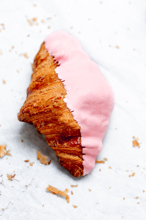 Strawberry Croissant. Fresh croissant with strawberry topping  isolated on white background. Macro image,  top viewの写真素材
