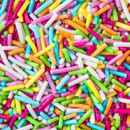 Sugar sprinkles textured background. Sweet decoration for cake and bakeryの写真素材