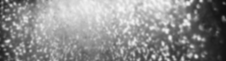 Black  background with sparkling lights. Abstract black and white bokeh lights and stars. Festive,...