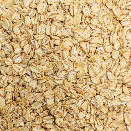 Oat flakes Pattern. Oatmeal textured background,  top view