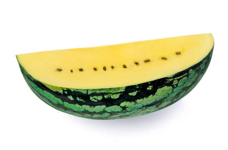 Watermelon fruit. Slice of yellow watermelon isolated on white background.の写真素材