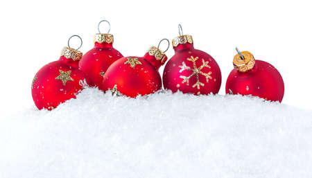 Christmas Decorations - snow and red Balls isolated on white background. Winter, Xmas greeting cardの写真素材