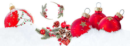 Christmas Composition with Christmas Tree Decorations, Pine Branches and red Baubles isolated on white backgroundの写真素材
