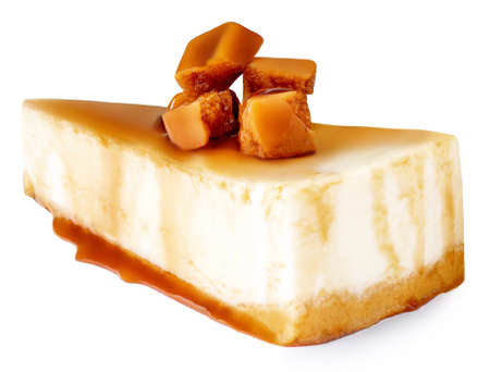 Slice Of Cheesecake with caramel sauce isolated on a white background.の写真素材
