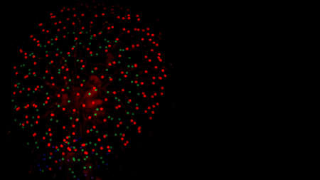 Holiday Fireworks at New Year Eve. Abstract Festive background with fireworks sparkles. Copyspace