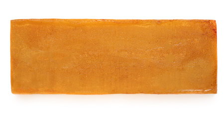 Turron nougat - traditional Spanish almond dessert isolated on white background. Christmas Turron candy with caramelの写真素材