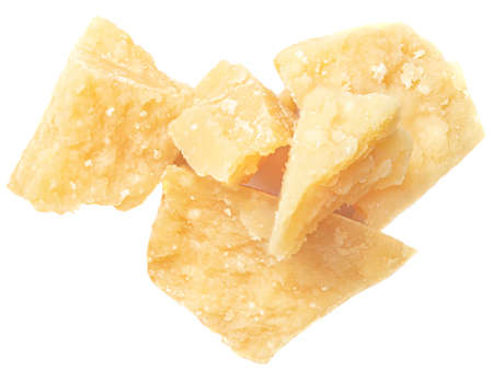 Parmesan cheese (Parmigiano, Grana) isolated on white background. Hard mature cheese, pile, top view.の写真素材