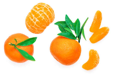 Tangerine or clementine oranges fruits with green leaf isolated on white background. Fresh mandarins Pattern. Creative layout. Top view. Flat layの写真素材