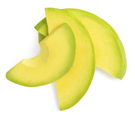 Avocado slices isolated on white background. Top view avocado fruit piecesの写真素材