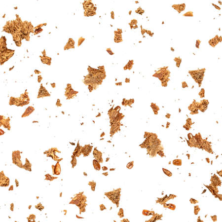Wholegrain bread crumbs isolated on white background. Food Pattern. Top view. Flat layの写真素材