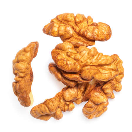 Walnut Isolated. Pile of Walnut kernel Nut on white background. Top view. Flat layの写真素材