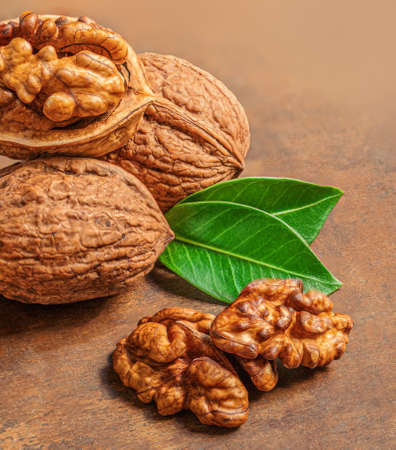 Walnut. Fresh Walnut kernel Nut on wooden background with copyspace. Top view.の写真素材