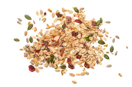Oat flakes with Nuts, seeds and dried fruits isolated on white background. Granola Flat lay. top viewの写真素材