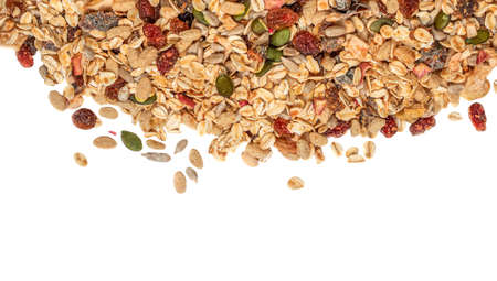 Oat flakes with Nuts, seeds and dried fruits isolated on white background. Granola Flat lay. top viewの写真素材