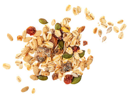 Oat flakes with Nuts, seeds and dried fruits isolated on white background. Granola Flat lay. top viewの写真素材