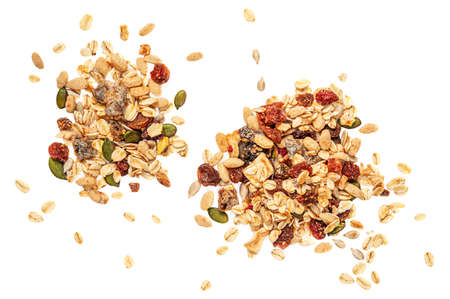 Oat flakes with Nuts, seeds and dried fruits isolated on white background. Muesli Collection Flat lay. top viewの写真素材