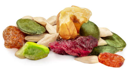 Nuts and seeds isolated over the white background. Creative layout made of granola or muesli Flat lay.の写真素材