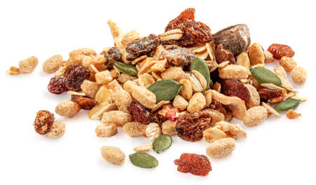 Nuts and seeds isolated over the white background. Creative layout made of granola or muesli Flat lay.の写真素材