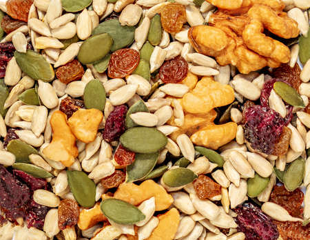 Nuts and seeds as a background. Pattern of granola or muesli Top viewの写真素材