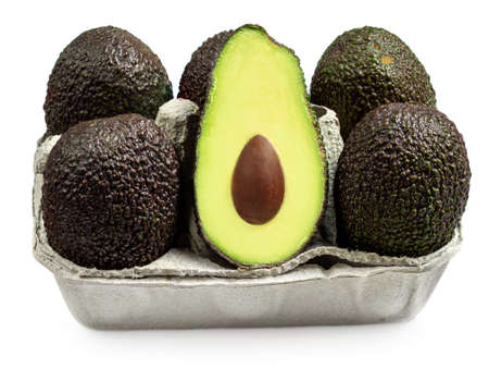Avocado fruit isolated on white background. Organic avocado with seed in a cartoon box.