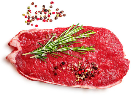 Fresh beef steak isolated on white background, top view.の写真素材