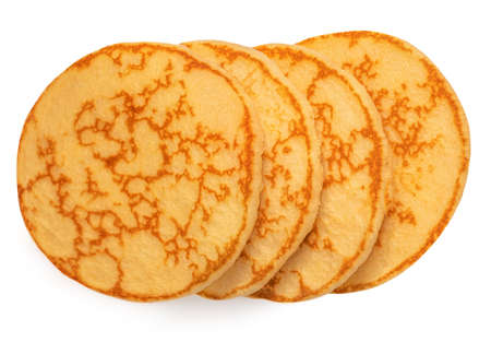 Heap of fluffy pancakes isolated on white background. Pancakes for breakfast top viewの写真素材