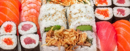 Sushi pattern. Sushi set with rice, salmon and shrimps top view. Japanese restaurant menu.の写真素材