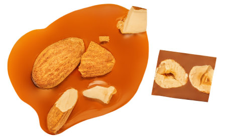 Caramel with almond nuts and caramel sauce isolated on a white background close up. top view. flat layの写真素材