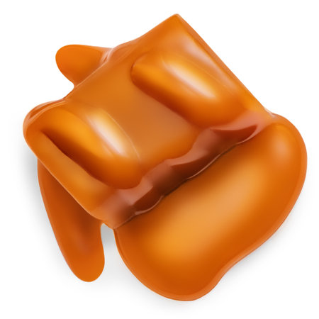 Sweet melted caramel with sauce flowing on caramel candy isolated on white background. top view. flat layの写真素材
