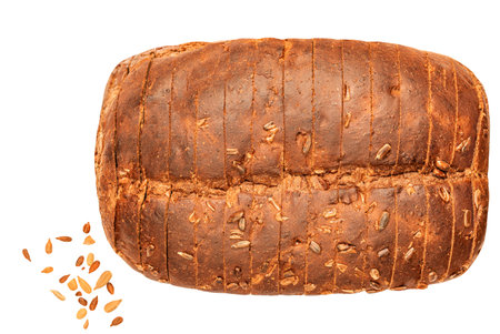 Wholegrain Bread loaf with bread crumbs isolated on white background. top view. flat lay.の写真素材