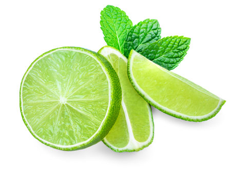 Lime fruit with mint leaf isolated on white background. Lime citrus sliceの写真素材