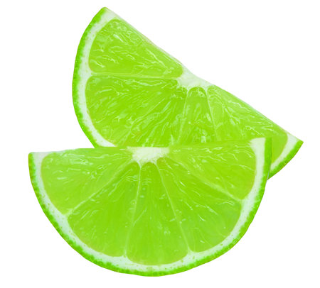 Lime slice isolated on white background. Lime citrus fruit closeupの写真素材