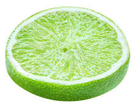 Lime slice isolated on white background. Lime citrus fruit closeupの写真素材