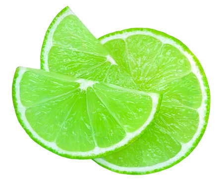 Lime slice isolated on white background. Lime citrus fruit closeupの写真素材