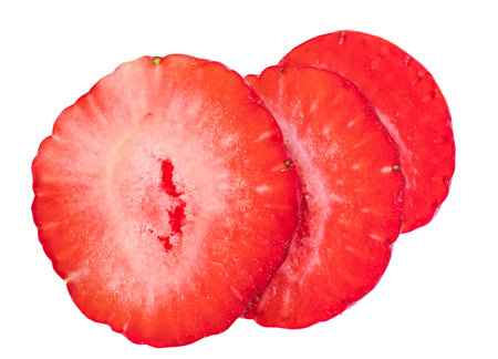 Juicy Strawberry slices isolated on white background. Creative layout with Strawberry fruits Top view. flat layの写真素材