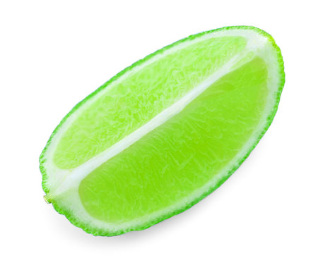 Lime slice isolated on white background. Lime citrus fruit closeupの写真素材
