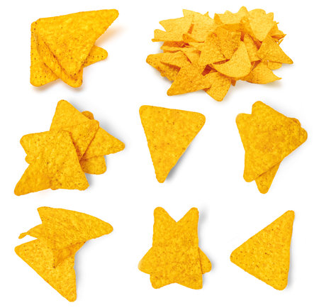 Nachos chips isolated on white background. Crispy chips Top view. Flat lay. creative food layoutの写真素材