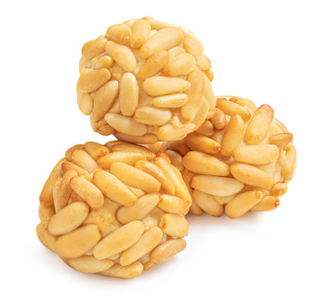 Panellets pine nuts isolated on white background. Typical Catalan dessert panels in Spainの写真素材