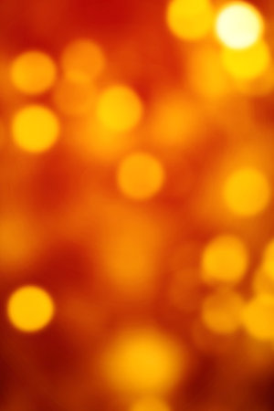 Red Christmas Background with golden Bokeh lights. Xmas defocused wallpaperの写真素材
