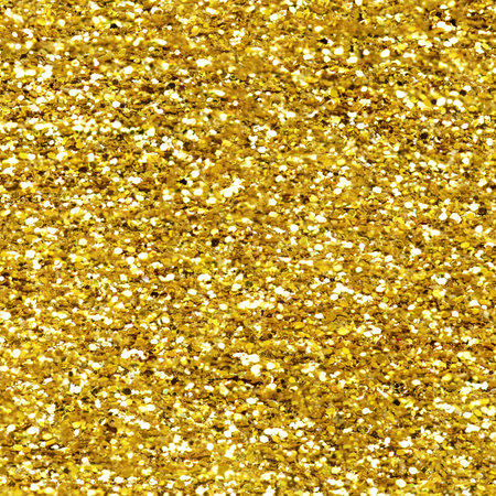 Gold glitter texture sparkling shiny background for Christmas card. Twinkly golden glitter lights grunge backgroundの写真素材